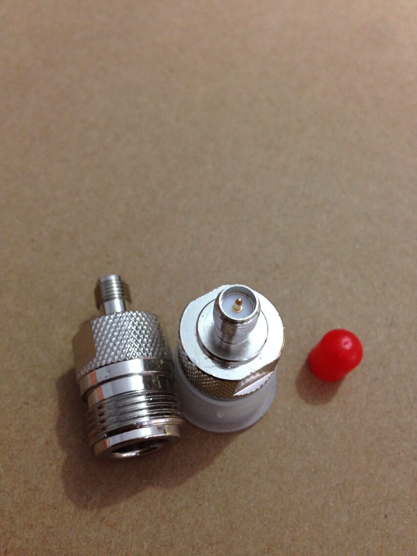 Full copper adapter converts head N female head (outer screw inner hole) to turn RP-SMA head (outer screw inner needle)