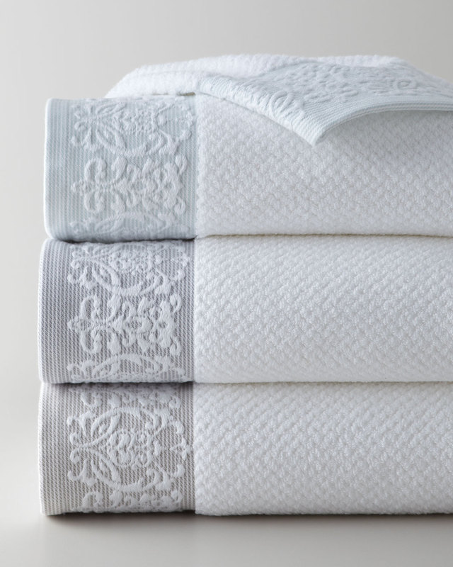 Playful French-Style Embossed Floral Satin Towel and Bath Towel Set, Available in Multiple Colors Playful French-Style Embossed Floral Satin Towel and Bath Towel Set, Available in Multiple Colors