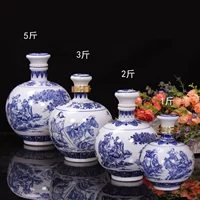 Bình gốm 1 kg 2 kg 3 kg 5 kg Jingdezhen chai sứ gốm sứ màu xanh và trắng tám chai bất tử niêm phong trống rỗng đặt khóa gia ly ruou vang