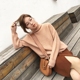 Daxi tự chế mùa thu mới khí chất rắn màu lỏng lẻo cao cổ áo len nữ thả vai tay áo đầu ấm đan áo thu đông nữ Áo len