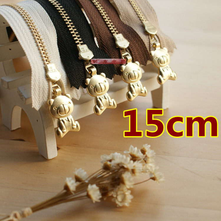 YKK zipper (double-sided three-dimensional gold and copper bear automatic lock slider) No. 3 tooth 15cm closed end