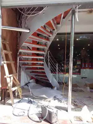 Luxury rotating stair steel wood staircase custom duplex household solid wood pedal column handrail guardrail