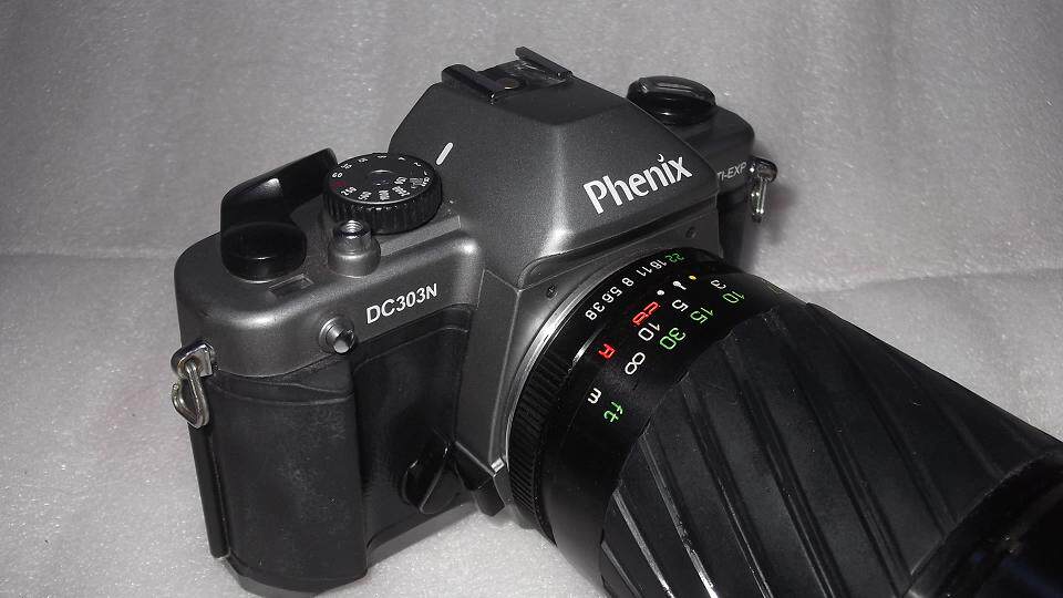Phoenix DC303N with metering zoom F28-135MM lens film SLR camera for photography