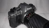 Phoenix DC303N film SLR camera with metering zoom F28-135MM lens for photography