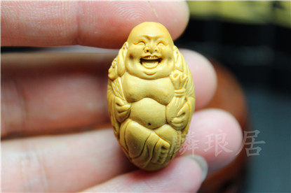 Olive nucleus carved Mailu smile always joyful hand carved single peg fun