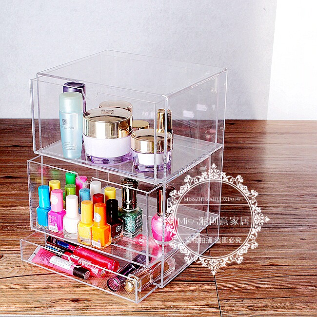 Three layers of transparent skin care products makeup cream nail polish lipstick eyebrow brush eye shadow finishing drawer box storage box