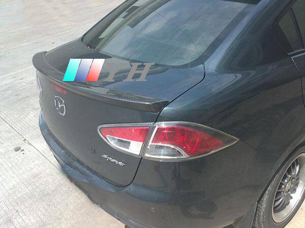 Suitable for carbon fiber MazdaM2 Jinxiang car modification tail