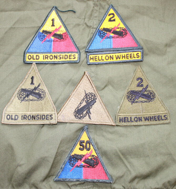 The USARMY Armored Division Arm Badge On The Arm's Arm.