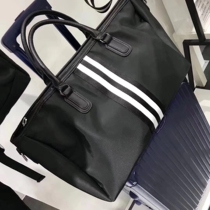 Korean version Black and white strip Coloured canvas matched genuine leather travel bag Female hand large capacity Travel baggage bag 17451