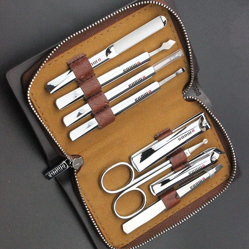 New products Europe and America Personality Nail Cut Suit Armor Tool Scissors Sleeve Multifunction Medecine Box 8 pieces