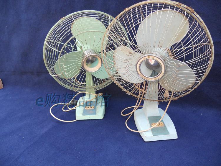 Old electric fans, old objects, movie props, window display, photography, retro fans, nostalgic, antique