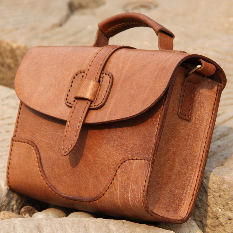 Handmade hard cowhide shaped shoulder bag diagonal handbag head layer vegetable tanned leather business casual fashion Europe and the United States