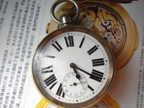 A century-old pocket watch (weighing half a catty)