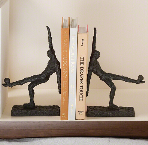 The beauty of the imported sport in New York's Lower City Park is the abstract cast iron book stall 