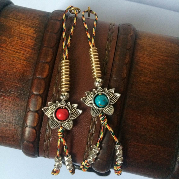 31 31 number of alloy hidden silver lotus pendants with playhand string of notes with small string of colorful threads handwoven without sliding beads