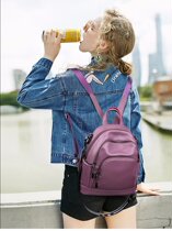 European station leather backpack female 2021 new Korean fashion trend small backpack casual soft leather student school bag