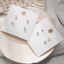 Korean version of simple temperament cherry blossom clover earrings new personality Joker Super fairy elegant fashion ear clip earrings