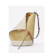 Star with the same paragraph 2022 new Korean version of the leather womens bag retro matte straw decorative bucket bag shoulder messenger bag