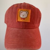 Who takes the cuddly orange little bear hat duck tongue can regulate the womens cap