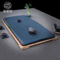 Shiliju whole black gold stone retro tea tray stone head tea table handmade household simple black stone drainage tea Cheng tea sea