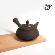 Spot imported from Japan often slippery people made of water black mud pine skin emergency teapot Japanese tea set stove There is a pot of tea on the stove