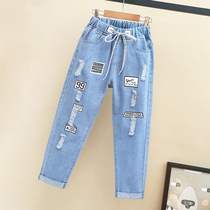 Girl pants autumn 2021 new large childrens trousers loose foreign style Korean spring and autumn childrens broken jeans