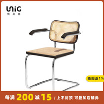 Uniju丨Designer rattan cantilever chair solid wood steel pipe leather Nordic light luxury ins minimalist log color