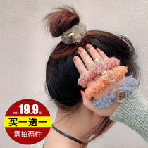 Japan and South Koreas new chic color lamb hair rope autumn and winter meatballs hair ring head rope plush leather band womens hair accessories