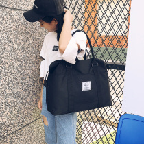 Bag Womens large-capacity travel portable clothes travel bags for going out to Bao Ma male Canvas light student bags