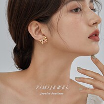 YIMIJEWEL simple golden bow mosquito coil ear clip female no ear piercing niche design earrings 925 silver needles