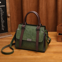 European station fashion retro handbag womens 2021 new leather womens bag Korean version of simple and wild messenger shoulder bag