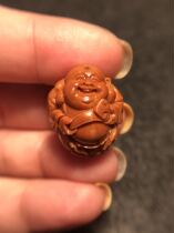 The pure handmade olive nuclear carvings are made of