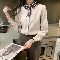 Shirt woman design feeling small crowdsourced 2022 new autumn and winter thickened grindroe collar butterfly knot foreign air blouses to bottom