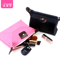 Small portable net red simple large capacity travel portable cute storage bag Striped waterproof makeup bag handbag