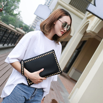 Temperament clutch female 2021 new large capacity womens handbag clip bag wild fashion rivet envelope hand grab bag