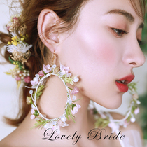 Super fairy Sen womens pastoral style simulation color flowers handmade fairy exaggerated round earrings without pierced ears Wedding jewelry