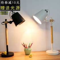 Nordic eye lamp simple creative student dormitory bedside lamp modern fashion solid wood dimming remote control Library light