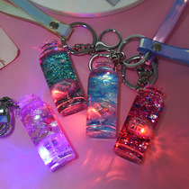Milk bottle liquid quicksand luminous acrylic car keychain magic leather rope trembling sound Net Red student bag pendant