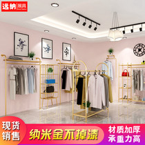 Yuan Na clothing store display rack on the wall hanging hanging clothes rack display ins golden woman shelf landing Nakajima