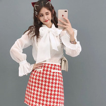 Sweet foreign style big bow shirt female 2020 early autumn new Korean loose trumpet sleeve Joker top