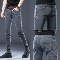 European station jeans men Korean version of the tide brand stretch slim-fitting small feet trousers spring and summer thin section soot casual pants men
