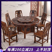 All solid wood round dining table Household dining table with turntable Chinese carved oak large round table Antique dining table and chair combination