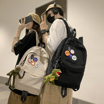 School bag female junior high school student high school student simple style travel backpack men summer 2021 new large capacity backpack