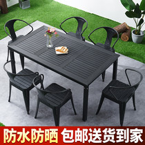 Outdoor plastic wood table and chairs Outer swing open terrace patio table and chairs waterproof sunscreen milk tea shop café embalming wood table and chairs