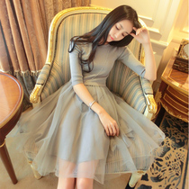 Spring and autumn new light and delicate style fashion mesh stitching knit dress long sleeves round neck waist canopy canopy A-shaped skirt tide