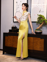 High-end catwalk cheongsam 2021 New Winter Yellow improved young costume long toast service