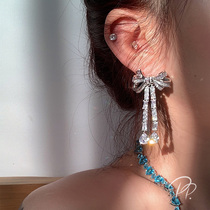 PP Ornament Retro Port Wind Herben Butterfly Knot Earrings Woman Superior Sense Light Extravaganza with a long ear pendant with a long ear