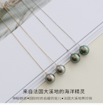 Xinlun 18K gold 8 - 14mm seawater Tahiti black pearl earrings long earrings round strong peacock green