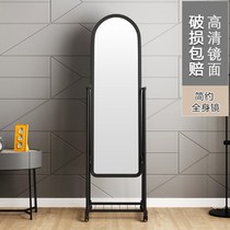 The dormitory has a small mirror on the ground and a full-body mirror in the European vertical college student wall black border