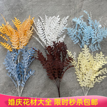 High-end wedding ceremony stage layout yard simulation silk flower art table willow leaf centipede leaf dry flower row decorative props